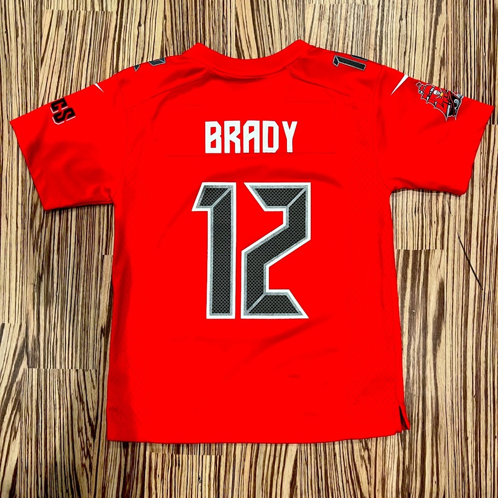 Size medium youth jersey 12 Tom Brady NFL Tampa Bay excellent condition